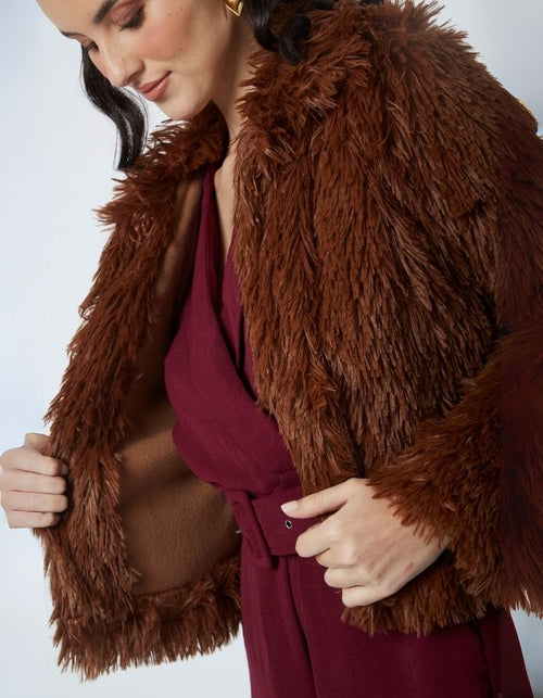 Abrigo Genesis Marrón